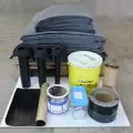 kit de toiture froide : membrane, colle, bande périmétrique, bande adhésive, fixations, évacuations d'eau pluviales.